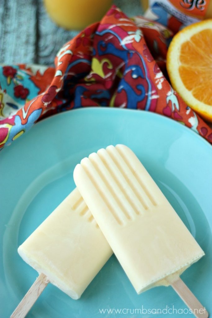 Creamy and cool, 2 Ingredient Orange Popsicles are so simple to make. You'll be enjoying this sweet, frozen treat in no time at all!